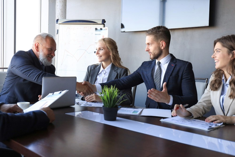 reunión de negocios Qwan